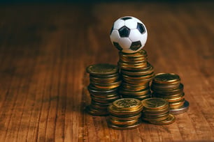 Soccer-bet-concept-with-football-and-money